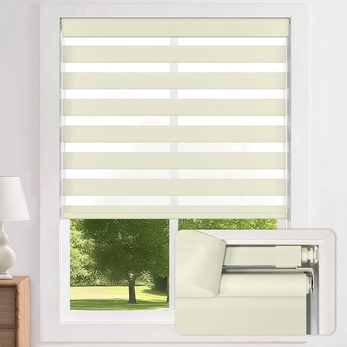 Beige roller blind shades with horizontal slats partially drawn over a window, shown in a bright room with a small inset detail of the blind track.